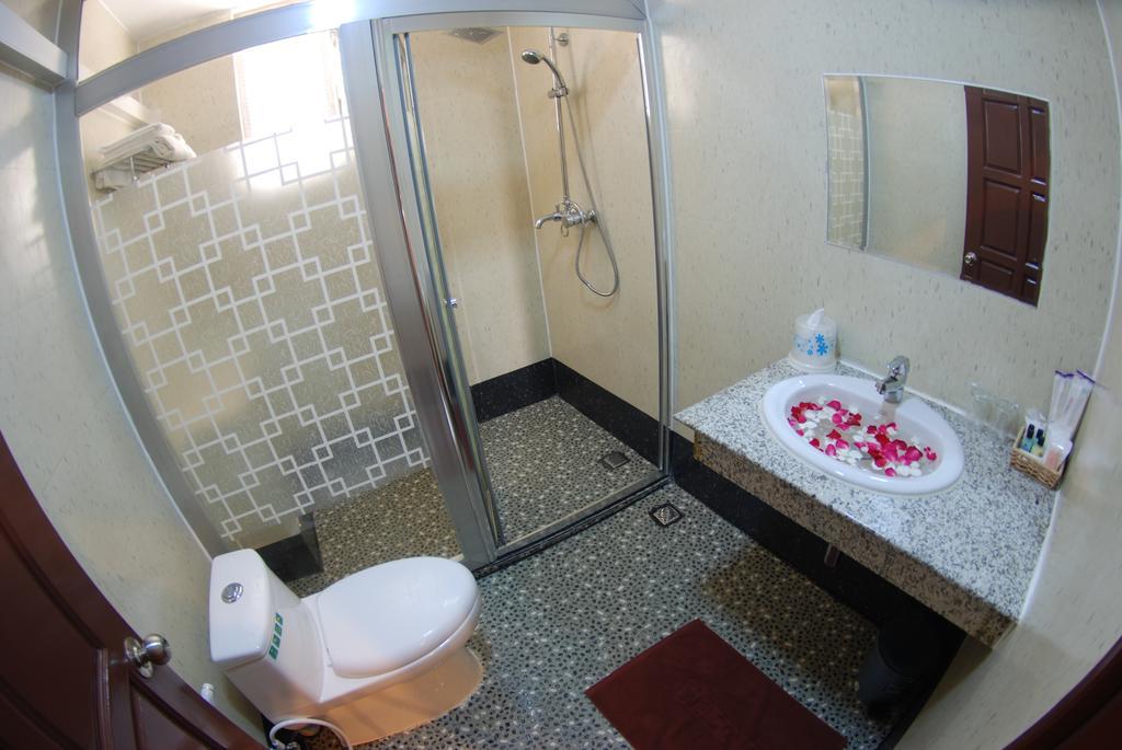 Holiday Hotel Yangón Habitación foto